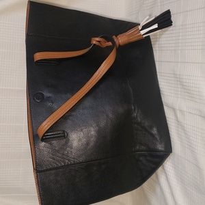 Tote bag, large faux leather,black with brown interior, with tassel's, women's.